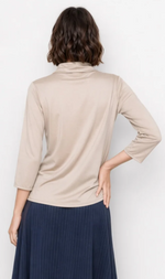 Cargar imagen en el visor de la galería, BLUSA SATEN CUELLO VULTO  COLOR BEIGE

