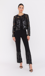 PANTALÓN  ELÁSTICO CON FLORES DE ECOPIEL
